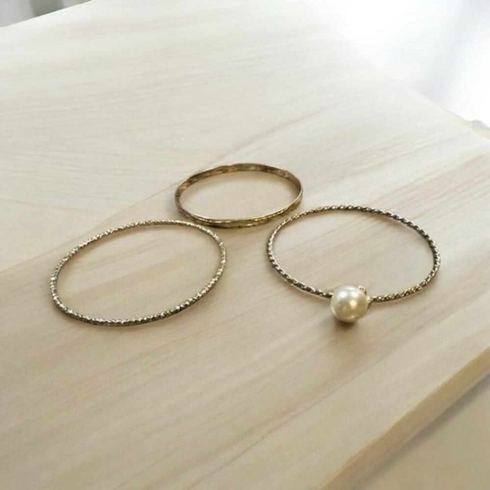 Hoop bangles bracelet gold tone beautiful . Look at photos for wear they are jus